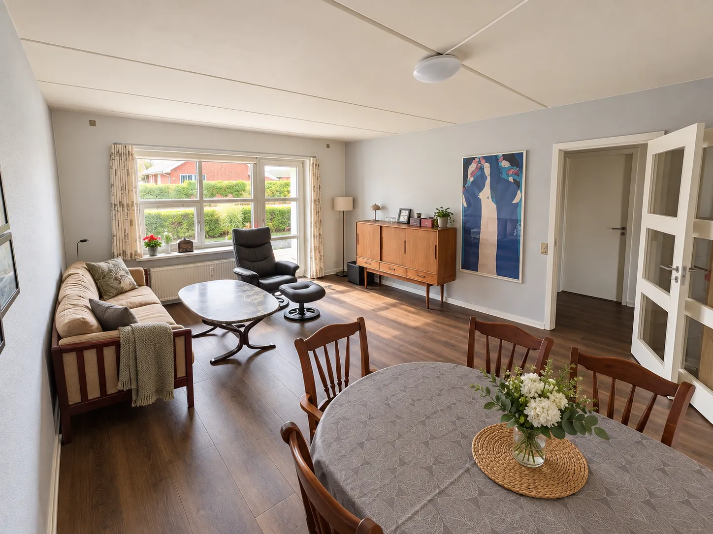 3-værelses andelsbolig på 84 m² i stueetagen med overdækket terrasse og have – centralt i Tarm