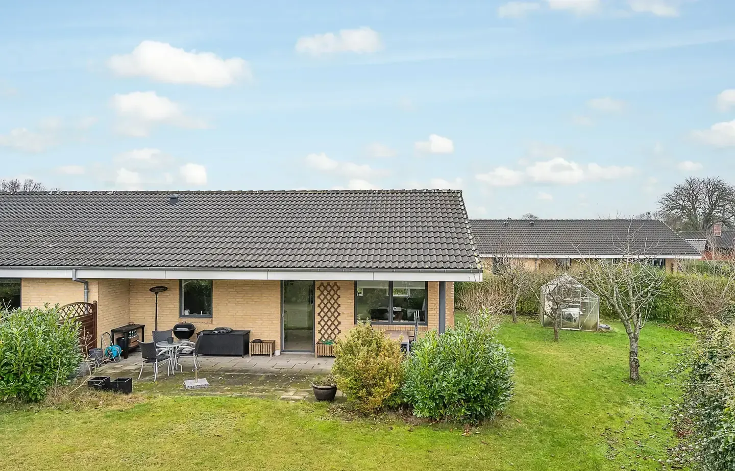 Flot indflytningsklar andelsbolig med skøn have - Skal ses!