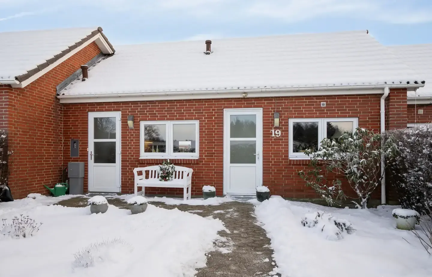 Velindrettet andelsbolig med god plads og udestue