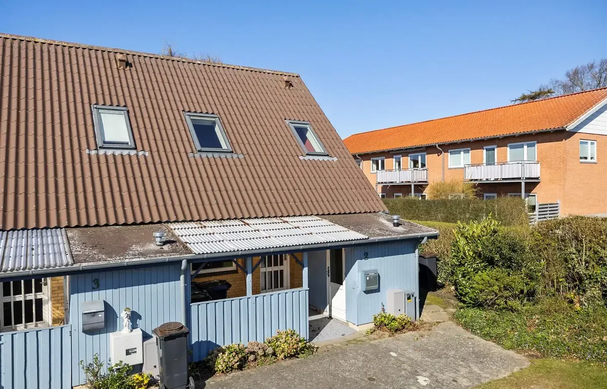 Velbeliggende andelsbolig med privat have
