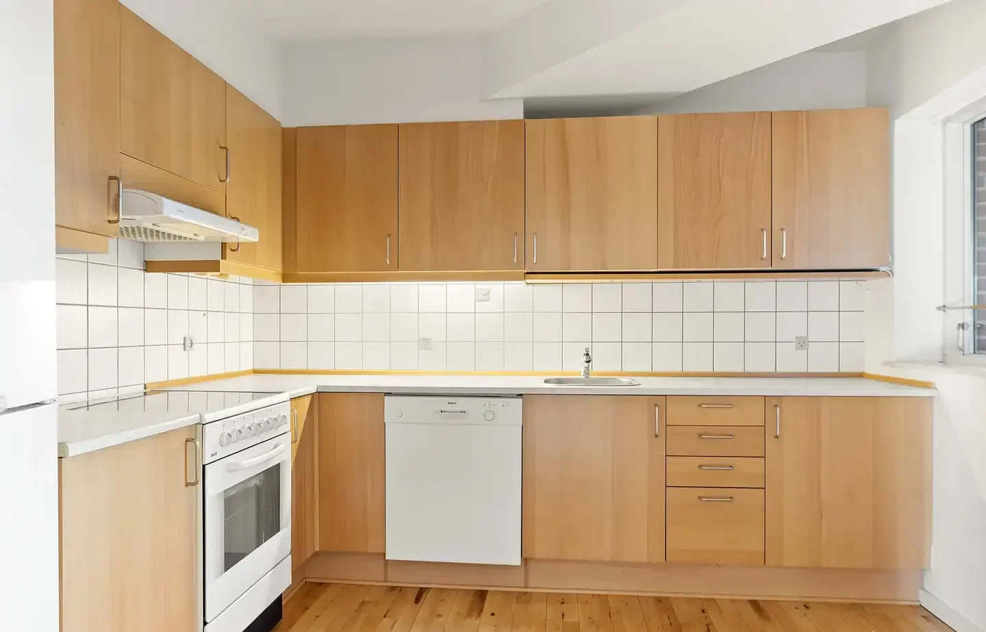 Andelsbolig med byvendt altan, tagterasse og elevator