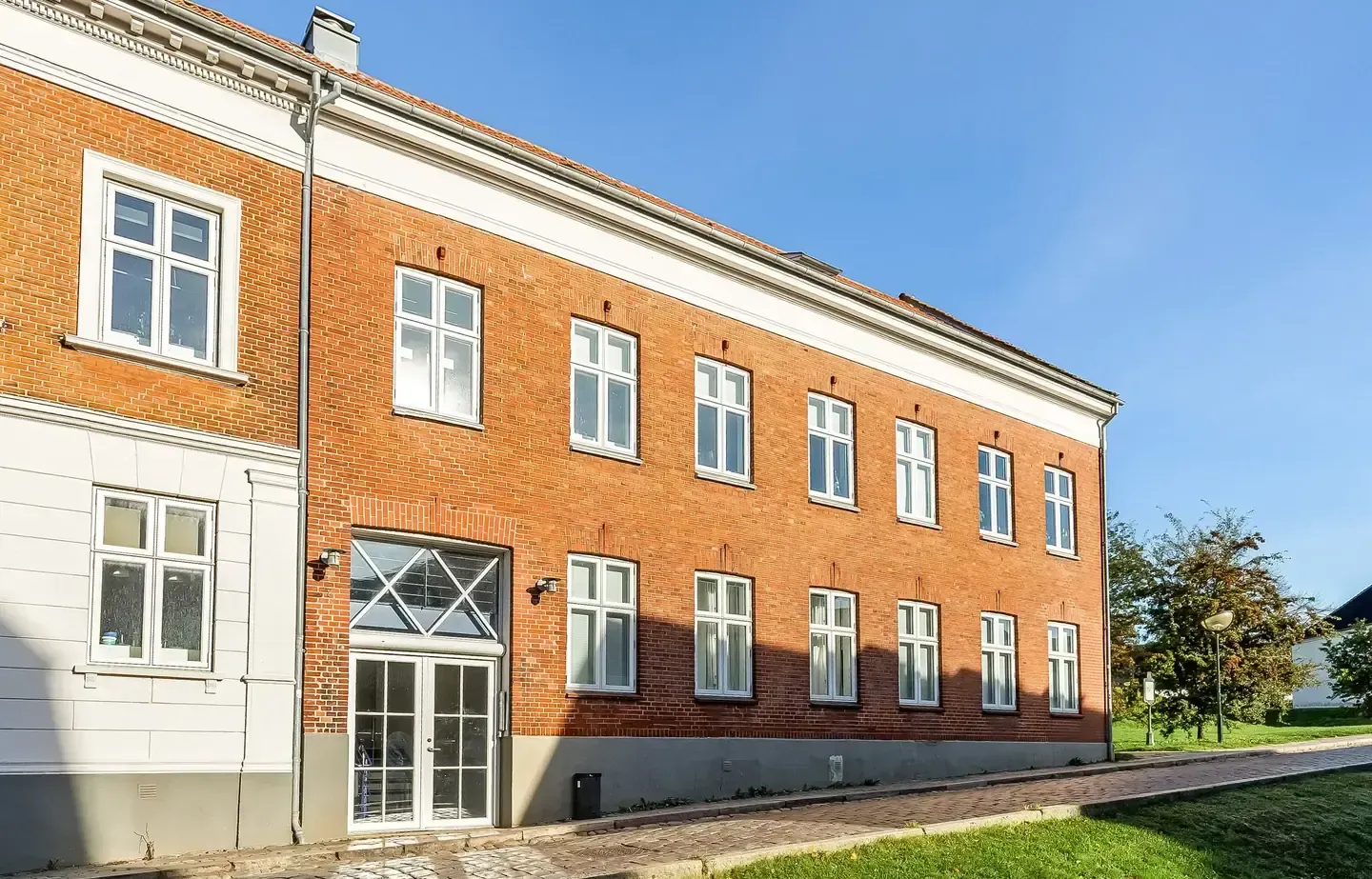 Centralt beliggende lys andelsbolig med udsigt til byens kongeslot