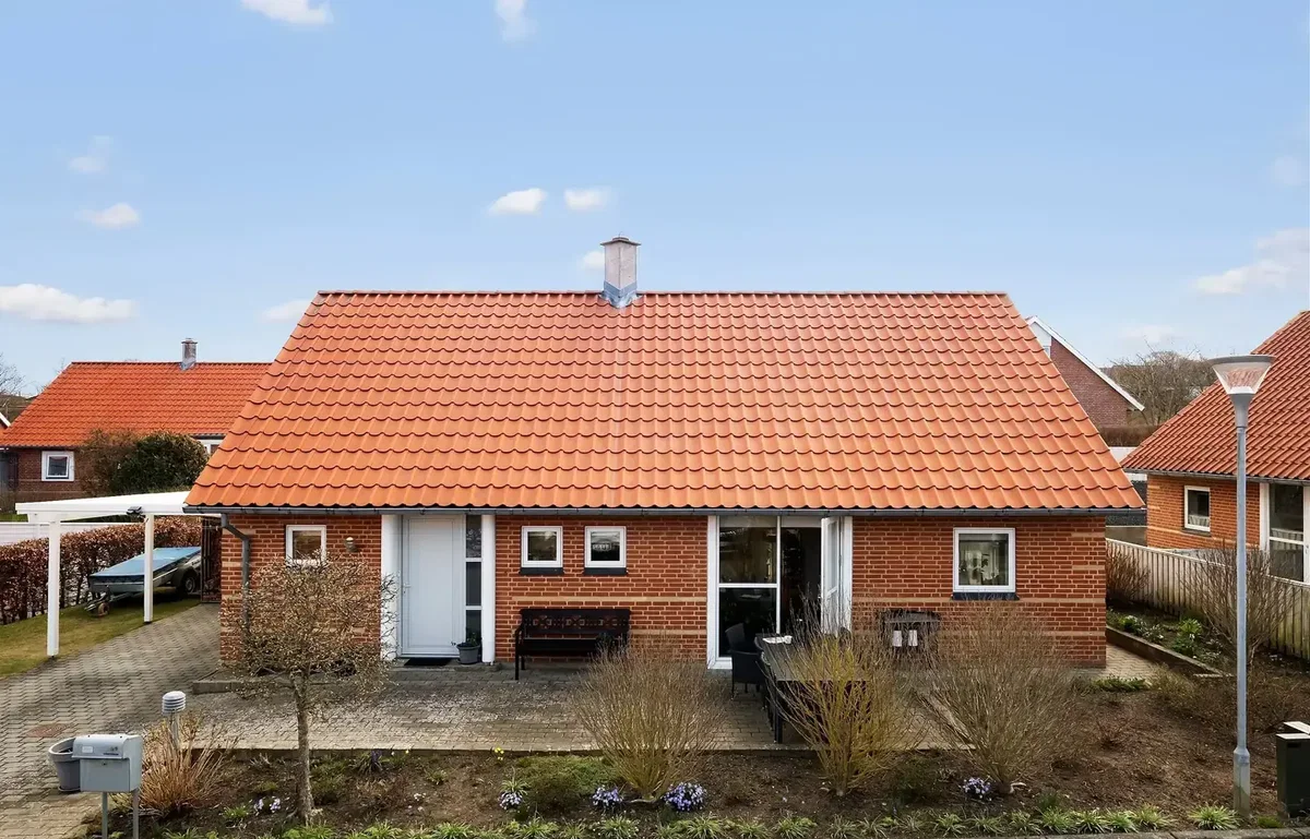 FLOT OG MEGET VELHOLDT ANDELSBOLIG I ATTRAKTIVT VILLAKVARTER TÆT VED MIDTBYEN.