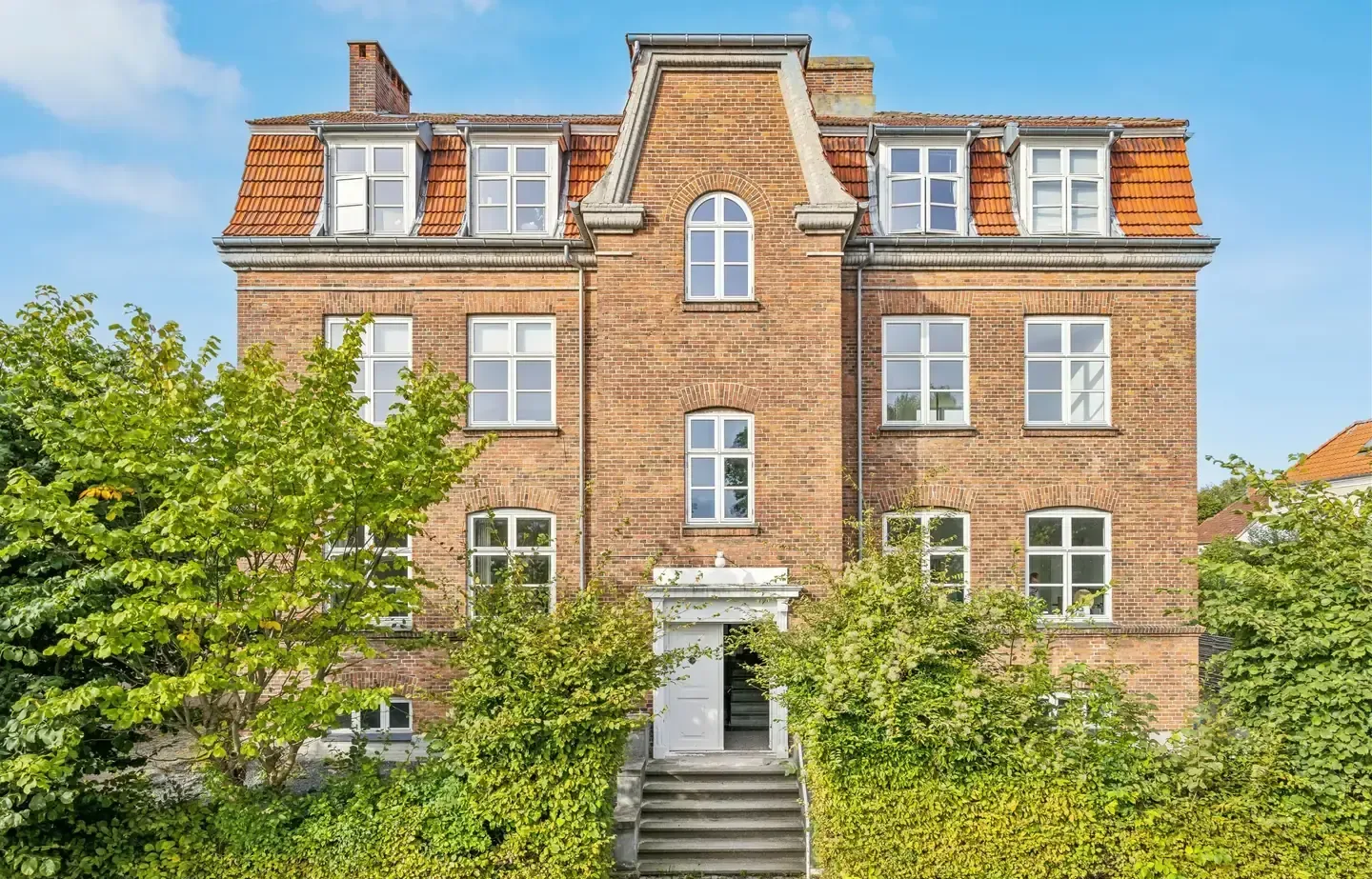 Skøn andelslejlighed med altan i blomsterkvarteret