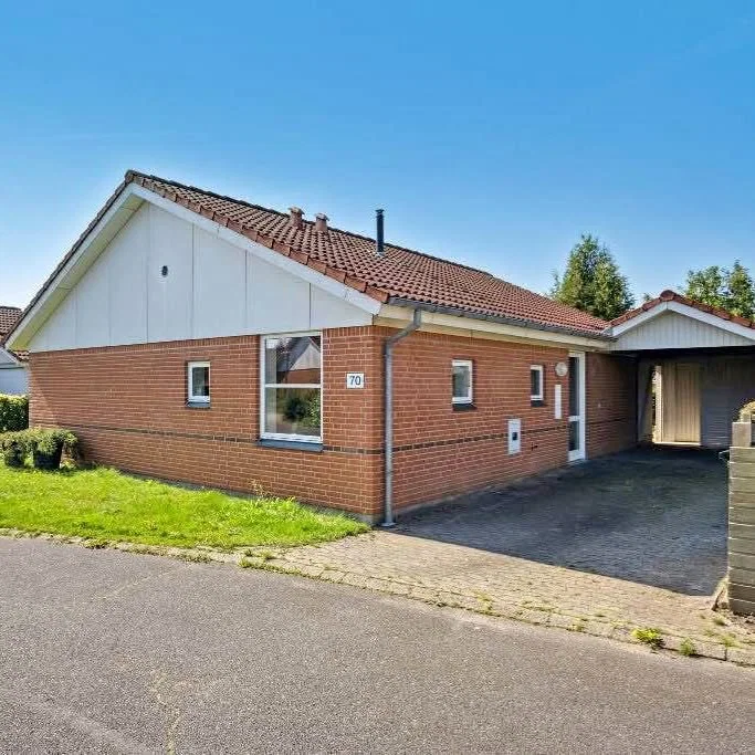 100 m² andelsbolig i Vester Nebel med have og carport