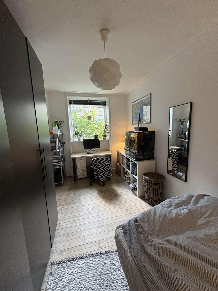 Høj stuelejlighed på kanten til Frederiksberg