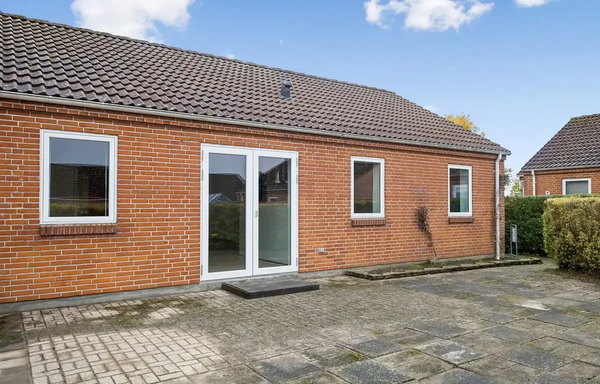 Velindrettet andelsbolig med sydvestvendt terrasse og lav boligafgift