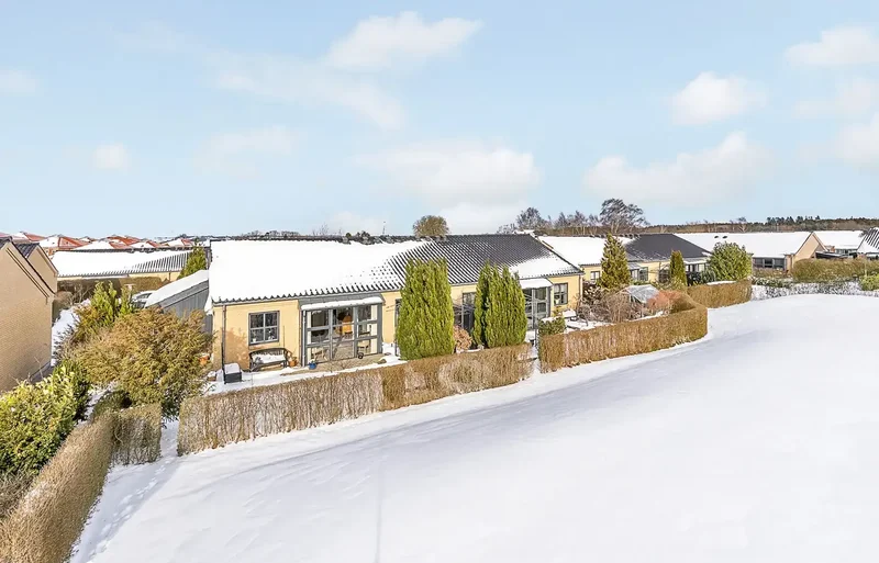 ASSENTOFT - VELBELIGGENDE ANDELSBOLIG FRA 2007 - FJERNVARME