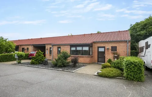 Indflytningsklar andelsbolig med udestue i attraktive Lind