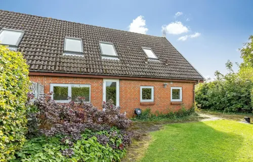 Andelsbolig med egen garage og lav boligafgift.