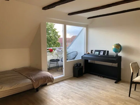 Hyggelig, lys andel i Valby med altan