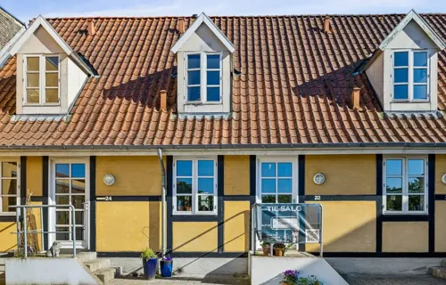 Velholdt andelsbolig med solrig terrasse centralt i Næstved