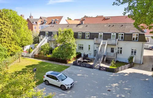 Yderst indbydende andelslejlighed centralt i Slagelse med adgang til skøn have