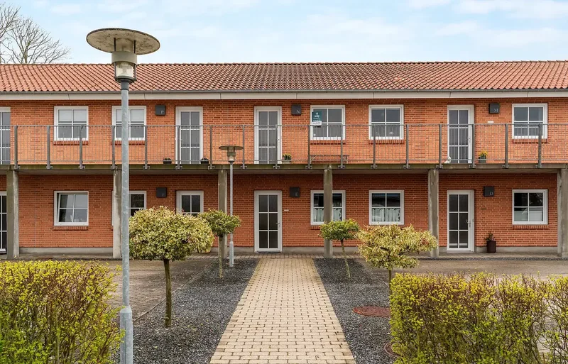 Velholdt andelsbolig med altan i Kristrup