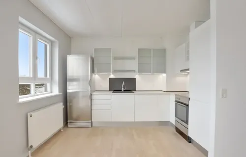 Velindrettet andelsbolig med altan og central beliggenhed i Vejgaard