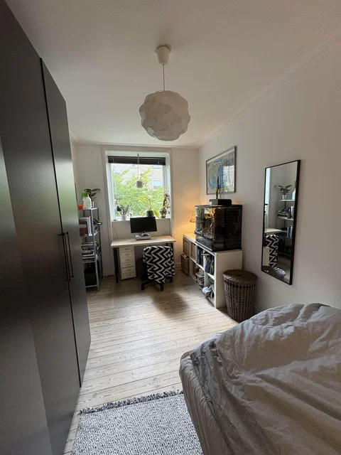 Høj stuelejlighed på kanten til Frederiksberg