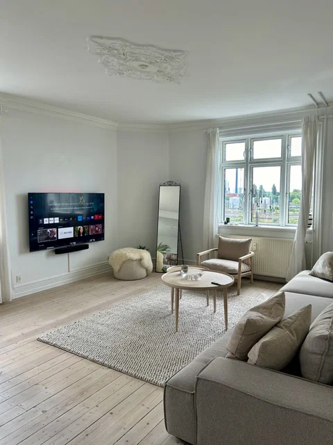 Lys og stilfuld lejlighed på 117 kvm i hjertet af Vesterbro, København