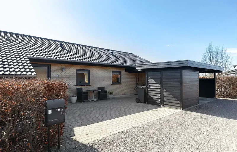 Charmerende andelsbolig med gennemtænkte løsninger og grøn have